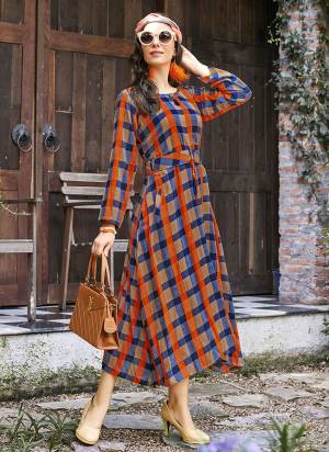 Checks Is Always In, So Grab This Designer Readymade Kurti In Orange And Black Color Fabricated On Rayon. This Kurti Is Beautified With Checks Prints All Over It. 