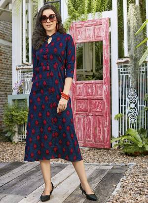 Enhance Your Personality Wearing This Readymade Straight  Kurti In Navy Blue Color Fabricated On Rayon Beautified with Prints All Over It. It Is Suitable For Casual Or Semi-Casual Wear.