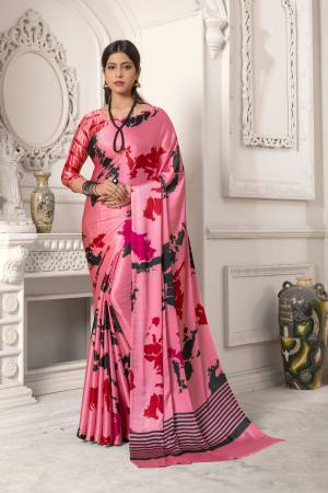 Look Pretty In This Pink Colored Saree Paired With Pink Colored Blouse, This Saree And Blouse Are Fabricated On Satin Silk Beautified With Abstract Prints All Over It. It Is Light Weight And Easy To Carry All Day Long. Buy Now.