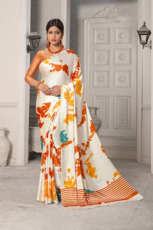 Simple And Elegant Looking Saree Is Here In White Color Paired With Orange Colored Blouse. This Saree And Blouse Are Fabricated On Satin Silk Beautified With Multi Colored Prints Giving It An Attractive Look.