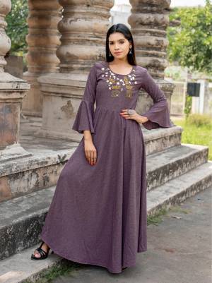 Another Very Pretty Colored Bell Sleeve Patterned Designer Readymade Kurti Is Here In Light Purple Color. This Kurti Has Attractive Hand Work Over The Yoke And Also The Fabric Ensured Superb Comfort All Day Long. 