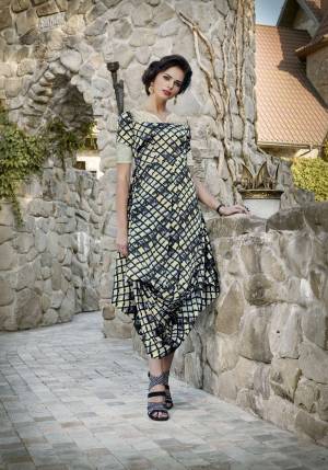 Multiple Shades In Grey Are Used In This Designer Readymade Kurti. It Is Fabricated On Satin Beautified With Prints All Over It. Buy Now.