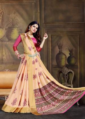 A Must Have Shade In Every Womens Wardrobe Is Here With This Pretty Saree In Peach Color Paired With Contrasting Dark Pink Colored Blouse. Its Art Silk Fabric Will Also Give A Rich Look To Your Personality. 