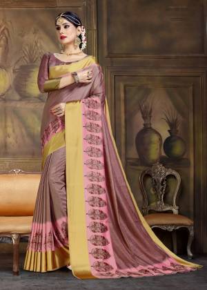 New And Unique Dusty  Purple Shade Is Here With This Saree In Mauve Color Paired With Mauve Colored Blouse. This Saree And Blouse Are Fabricated On Art Silk Beautified With Printed Border. 