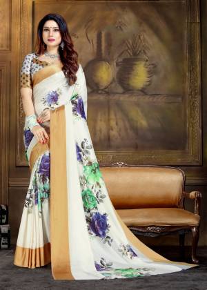 Simple Saree If Here For Your Semi-Casual Wear In White Color Paired With White Colored Blouse. This Saree And Blouse Are Silk based Beautified With Prints All Over It. 