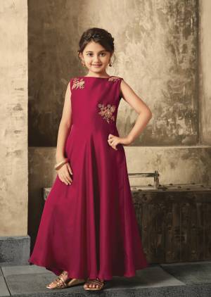 Give A Bright And Appealing Look To Yourself And Your Daughter With This Designer Floor Length Gown In Magenta Pink Color Fabricated On Satin Beautified With Embroidered Patch Work. This Lovely Colors Is Suitable For Both You And Your Daughter. 
