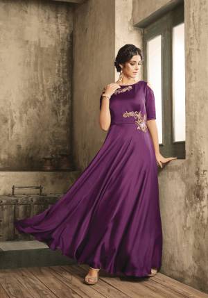 Shine Bright In This Beautifiul Designer Floor Length Gown In Purple Color Fabricated On Satin. This Pretty Gown Is Available For Both Age Group You And Your Daughter. Buy This Soon Before The Stock Ends.