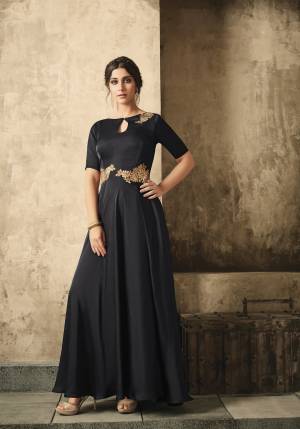 Give a Bold And Beautiful Look To Yourself And Your Daughter With This Designer Floor Length Gown In Black Color. This Mother Daughter Gown Is Fabricated On Satin Which Ensures Superb Comfort All Day Long.