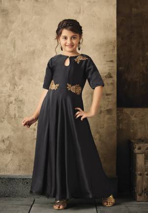 Give a Bold And Beautiful Look To Yourself And Your Daughter With This Designer Floor Length Gown In Black Color. This Mother Daughter Gown Is Fabricated On Satin Which Ensures Superb Comfort All Day Long.