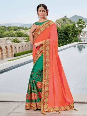 Vibrant and visually appealing, this dark peach and green color two tone silk satin saree. Ideal for party, festive & social gatherings. this gorgeous saree featuring a beautiful mix of designs. Its attractive color and heavy designer embroidered saree, moti design, also heavy designer blouse, half half design saree, beautiful floral design all over work over the attire & contrast hemline adds to the look. Comes along with a contrast unstitched blouse.