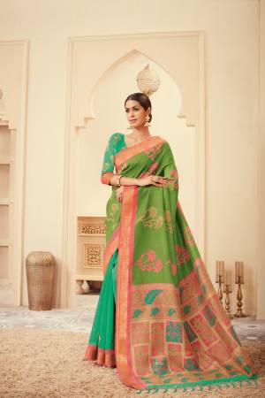 Celebrate This Festive Season With Ease And Comfort Wearing This Silk Based Saree In Green Color Paired With Green Colored Blouse. It Is Light Weight And easy To Drape. Buy Now.