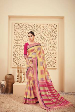 This Festive Season, Enjoy Comfortabley With Beauty, Grab This Saree In Yellow And Pink Color Paired With Pink Colored Blouse. This Saree And Blouse Are Fabricated On Art Silk Beautified With Prints All Over IT.