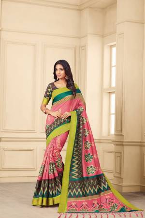 Look Pretty Wearing This Saree In Pink And Multi Color Paired With Contrasting Brown Colored Blouse. This Saree And Blouse Are Fabricated On Art silk Beautified With Intricate Prints All Over It. 