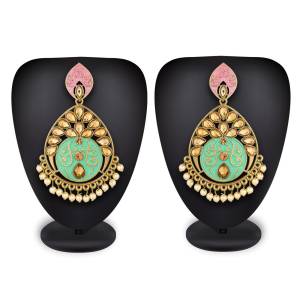Grab This Pretty Attractive Looking Earrings Set In Golden Color Highlighted With Pink And Light Green Color Beautified With Stone Work. This Earrings Set Is Light Weight And Can Be Paired With Same Or Any Contrasting Colored Traditional Attire.
