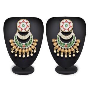 For A Proper Traditional Touch Grab This Pair Of Earrings In White Color Which Can Be Paired With Any Colored Attire. Buy This Lovely Set Now.