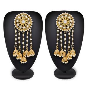 Beautiful Patterned Earrings Set Is Here With Multiple Jhumki Hangings. It Is In Golden Color So That It Can Be Paired With Any Colored Attire. 