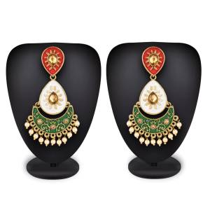 For A Proper Traditional Touch Grab This Pair Of Earrings In White, Red And Green Color Which Can Be Paired With Any Colored Attire. Buy This Lovely Set Now.