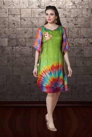 Celebrate This Festive Season With Beauty And Comfort Wearing This Kurti In Green Color Fabricated On Georgette. 