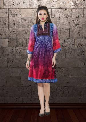 Flaunt Your Rich And Elegant Taste In This Blue And Pink Georgette Based Printed Kurti .