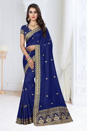 Shine Bright Wearing This Designer Saree In Royal Blue Color Paired With Royal Blue Colored Blouse. This Saree And Blouse Are Fabricated On Soft Silk Beautified With Jari Embroidery. 
