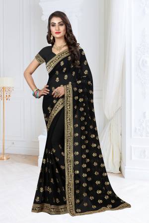 For A Bold And Beautiful Look, Grab This Designer Saree In Black Color Paired With Black Colored Blouse. This Saree And Blouse Are Georgette Based Beautified With Jari Embroidery And Stone Work.