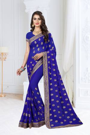 Shine Bright Wearing This Designer Saree In Royal Blue Color Paired With Royal Blue Colored Blouse. This Saree And Blouse Are Fabricated On Georgette Beautified With Jari Embroidery. 