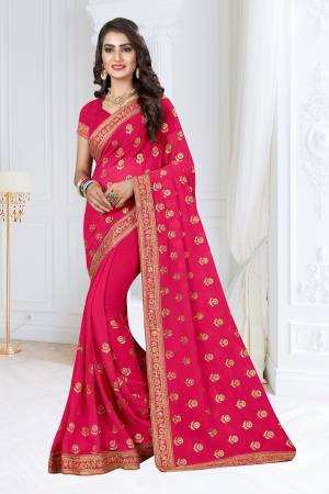 Shine Bright Wearing This Designer Saree In Rani Pink Color Paired With Rani Pink Colored Blouse. This Saree And Blouse Are Fabricated On Georgette Beautified With Jari Embroidery. 