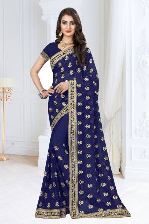 Enhance Your Personality Wearing This Rich And Elegant Looking dEsigner Saree In Navy Blue Color Paired With Navy Blue Colored Blouse. This Georgette Based Saree Is Light Weight And Ensures Superb Comfort all Day Long. 