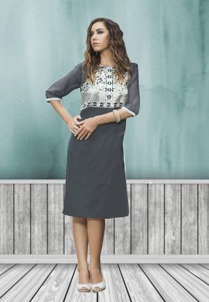 This kurti will keep you comfortable and relaxed all day long. The lovely kurti is silver colored floral embroidery work on the deep neck line. The Dark grey colored kurti is fabricated in georgette, while the inner is made of santoon fabric. This amazing kurti just for you.
