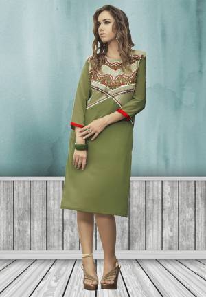 Featuring an attractive pattern this kurti will catch every passing eye. This green colored floral embroidery pattern on the neck line to make you look more beautiful. The Olive green colored kurti is fabricated in georgette, while the inner is made of santoon fabric. Get this lovely kurti now.