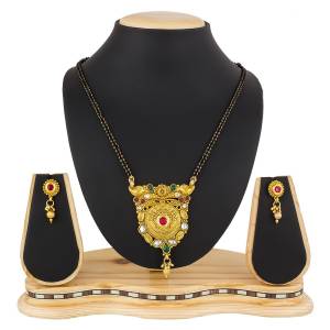 Here Is A Heavy Patterned Mangalsutra In Golden Color With Pretty Set Of Earrings. This Mangalsutra Is Suitable For Function OR Wedding Wear. It Can Be Paired With Any Colored Attire. 