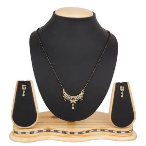 Instead Of Those Heavy Necklace, Carry This Beautiful And Elegant Looking Mamgalsutra Set At The Next Party You Attend. It Is Beautified With Diamond Work And You Can Pair This Up With Any Colored Attire.