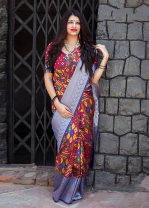 Add This Beautiful And Attractive Saree To Your Wardrobe In Maroon Color Paired With Maroon Colored Blouse. This Saree And Blouse Are Silk based Beautified With Weave All Over It. Its Pretty Shade Will Make You Look More Pretty.