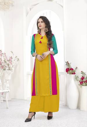Grab This Pretty Kurti For Festive Or Semi-Casual Wear In Yellow Color. It Is Faricated On Rayon Beautified With Thread Work. Also It Is Soft Towards Skin And Easy To Carry All Day Long. 