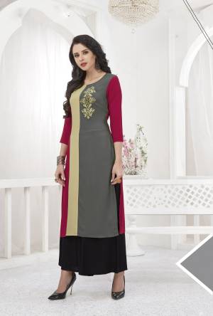 Flaunt Your Rich And Elegant Taste Wearing This Pretty Readymade Kurti In Grey And Maroon Color Fabricated Rayon. It Has Pretty Patch Work With Thread. Buy Now.