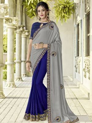 you Look striking and stunning afler wearing this grey and Royal Blue color silk fabrics and two tone bright georgette saree. look gorgeous at an upcoming any occasion wearing the saree. this party wear saree won't fail to impress everyone around you. designer embroidered saree, patch design, stone, heavy designer blouse, two color sarees, beautiful floral design Comes along with a contrast unstitched blouse.