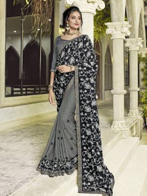 Get this amazing saree and look pretty like never before. wearing this black and grey color georgette and two tone chiffon saree. this gorgeous saree featuring a beautiful mix of designs. look gorgeous at an upcoming any occasion wearing the saree. designer embroidered saree, patch design, stone, heavy designer blouse, two color sarees, beautiful floral design Comes along with a contrast unstitched blouse.