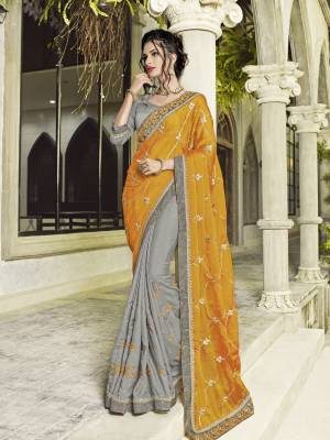 Impress everyone with your amazing Trendy look by draping this Musturd Yellow and grey color two tone bright georgette and silk fabrics saree. this party wear saree won't fail to impress everyone around you. this gorgeous saree featuring a beautiful mix of designs. designer embroidered saree, patch design, stone, heavy designer blouse, two color sarees, beautiful floral design Comes along with a contrast unstitched blouse.