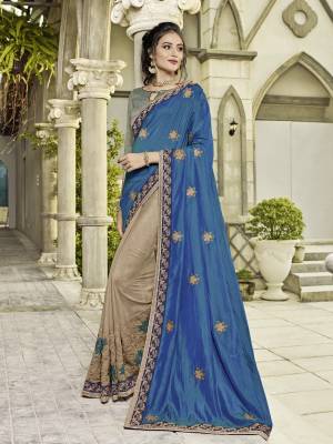 Classy, sensuous and versatile are the perfect words to describe this Blue and beige color two tone silk and silk saree. Ideal for party, festive & social gatherings. this gorgeous saree featuring a beautiful mix of designs. designer embroidered saree, patch design, heavy designer blouse, two color sarees, beautiful floral design Comes along with a contrast unstitched blouse.