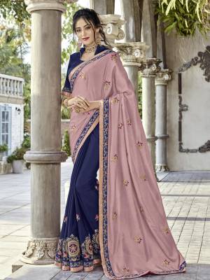 Presenting this Dusty Pink & Navy Blue color silk fabrics and moss chiffon saree. Ideal for party, festive & social gatherings. this gorgeous saree featuring a beautiful mix of designs. designer embroidered saree, patch design, heavy designer blouse, two color sarees, beautiful floral design Comes along with a contrast unstitched blouse.