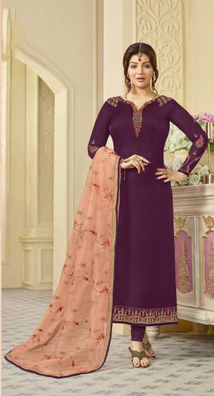 Lovely Color Pallete Is Here With This Designer Straight Suit In Wine Colored Top And Bottom Paired With Peach Colored Dupatta. Its Top Is Fabricated On Georgette Satin Paired With Santoon Bottom And Orgenza Silk Dupatta. 