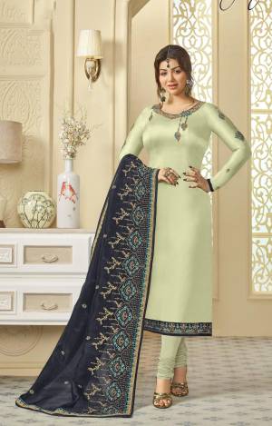 This Season Is About Subtle Shades And Pastel Play, So Grab This Beautiful Designer Suit In Pastel Green Colored Top And Bottom Paired With Contrasting Navy Blue Colored Dupatta. Its Top Is Fabricated On Georgette Satin Paired With Santoon Bottom And Oragenza Silk Dupatta. ALl Its Fabric Ensures Superb Comfort All Day Long.