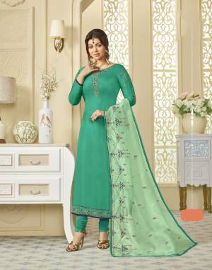 Add This Very Beautiful Designer Suit To Your Wardrobe In Sea Green Colored Top And Bottom Paired With Pastel Green Colored Dupatta.Its Top Is Georgette Satin Based Paired With Santoon Bottom And Orgenza Silk Dupatta. 