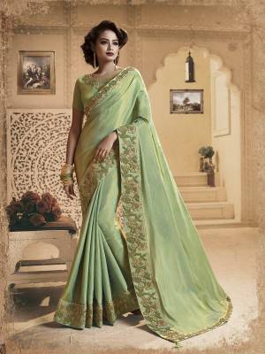 Lovely Shade In Green Is Here With This Designer Light Green Colored Saree Paired With Light Green Colored Blouse. This Saree And Blouse Are Fancy Silk Fabricated Beautified With Heavy Embroidered Lace Border. 