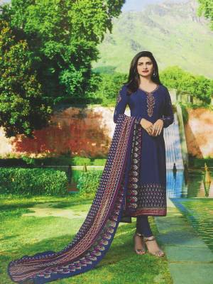 Enhance Your Personality Wearing This Designer Straight Suit In Navy Blue Color Paired With Navy Blue Colored Bottom And Dupatta. Its Top Is Fabricated On Crepe Paired With Santoon Bottom And Chiffon Dupatta. It Is Beautified With Prints And Embroidery. Buy Now.