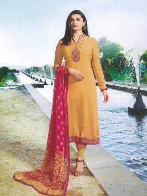 Celebrate This Festive Seaosn Wearing This Beautiful Designer Straight Suit In Musturd Yellow Color Paired With Rani Pink Colored Dupatta, Its Top IS Crepe Fabricated Paired With Santoon Bottom And Chiffon Dupatta. Buy Now.