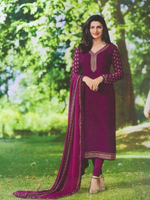 Enhance Your Personality Wearing This Designer Straight Suit In Purple Color Paired With Purple Colored Bottom And Dupatta. Its Top Is Fabricated On Crepe Paired With Santoon Bottom And Chiffon Dupatta. It Is Beautified With Prints And Embroidery. Buy Now.