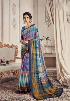 Add This Pretty Blue Colored Saree To Your Wardrobe Paired With Blue Colored Blouse. This Saree And Blouse Are Georgette Fabricated Beautified with Checks Prints. It Is Light Weight And Easy To Drape. 