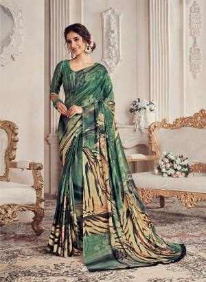 For Your Semi-Casual Wear, Grab This Beautiful Green Colored Saree Paired With Green Colored Blouse. This Saree And Blouse Are Georgette Based Beautified With Checks Prints All Over The Saree. Buy Now.