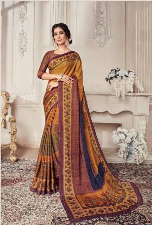 Go Colorful With This Very Pretty Multi Colored Saree Paired With Brown Colored Blouse. This Saree Is Georgette Based Beautified With Small And Bold Prints All Over It. Buy Now.